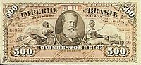 Photograph of a banknote containing a picture of a bearded man in the center and thee number 500 printed in the corners
