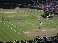 Nadal serves to Federer during the 2006 Wimbledon final