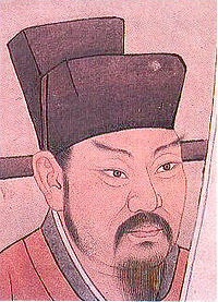 A head-shot style painting of a middle aged to late middle aged man with pointed eyebrows, sideburns, a mustache, and a beard. He is wearing a red robe and a black, square cut hat.