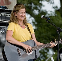 Christine Balfa playing the guitar at the 2009 Breaux Bridge Crawfish Festival.