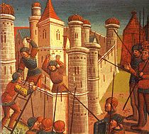 Several men with spears and shields surround a miniaturized citadel guarded by two under-equipped soldiers holding stones.