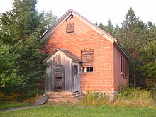Photograph of a one room schoolhouse in northern Price County, Wisconsin.