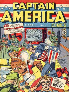 The front page of the first Captain America comic depicts Captain America punching Adolf Hitler in the jaw. A Nazi soldier's bullet deflects from Captain America's shield, while Adolf Hitler falls onto a map of the United States of America and a document reading 'Sabotage plans for U.S.A.'