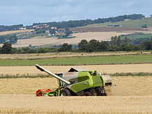 A combine harvester in use