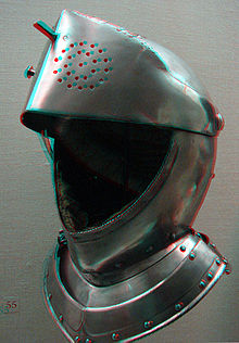 A visored helmet following the contuors of the head.