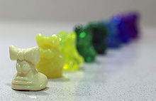 8 Classic Crazy Bones, lined up in a row