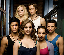 Six young actors in dance clothing.