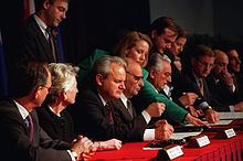 Seated from left to right: Slobodan Milošević, Alija Izetbegović, Franjo Tuđman signing the final peace agreement in Paris on December 14, 1995.