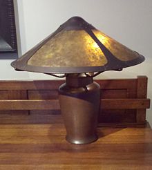 Photo of a copper lamp designed by Dirk Van Erp