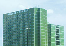 Multi-storey rectangular building with outlined windows; top floor is labeled 'EVA Air'.