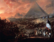 Cavalry battlescene with pyramids in background