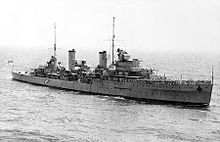 A large World War II-era warship at sea