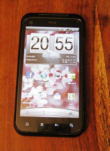The HTC Incredible S smartphone displaying the device's default home screen.