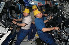 ISS15 Crew with yellow hats.jpg