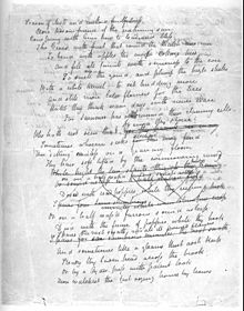 A white sheet of paper that is completely filled with a poem in cursive hand writing. Many of the lines mid-way down the page are scratched out.