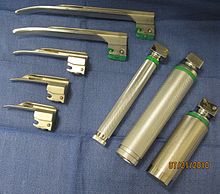 Laryngoscope handles with an assortment of Miller blades