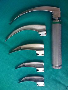 Laryngoscope handles with an assortment of Macintosh blades