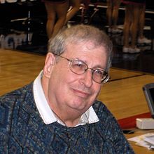 picture of Mel Greenberg attending a basketball game