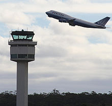 Melbourne airport control tower and united B747.jpg