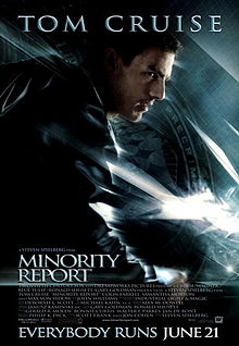 A man wearing a leather jacket stands in a running pose. A flag with the PreCrime Department insignia stands in the background. The image has a blue tint, and many flashing lights. Tom Cruise's name stands atop the poster, and the film title, credits, and the tagline "Everybody Runs June 21" are on the bottom.
