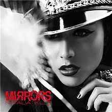 A black and white image of a black-haired woman. The words "Mirrors" and "Natalia Kills" are written over the top, with "Mirrors" having a shattered effect.