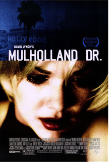 Theatrical release poster showing the film's title against a dark blue image of the Hollywood sign in Los Angeles atop another still shot of Laura Elena Harring in a blond wig staring at something off camera toward the lower right corner.