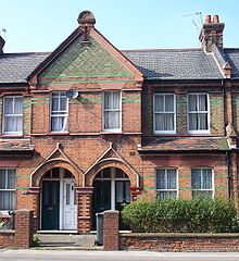 What appear to be normal two-storey terraced houses, but with two doors in each porch instead of one