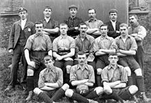 Monochrome photograph of the team