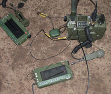 military radio a telephone type handset can be seen