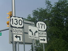 A set of three signs reading U.S. Route 130 south left, left turn right turn only, and Route 171 north right