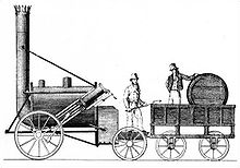 Cylindrical railway locomotive, with a very tall pipe at one end and a barrel-shaped tender at the other.
