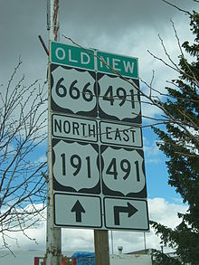 Sign assembly with 4 signs:Top left – Old US 666, Top right – New US 491, Bottom Left – North US 191 straight ahead, Bottom Right – US 491 Right turn