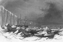 sailing ship with icebergs