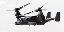  A V-22 on a test flight with its rotors rotated almost to vertical.