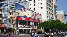 Big-city street with corner restaurant