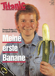 "Titanic" magazine cover showing a smiling young woman with a denim jacket and home-made perm holding a large cucumber peeled in the style of a banana