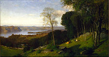 A painting in which wooded land at the right yields to a cleared drop in the center and left with a view of a wide river and hills beyond