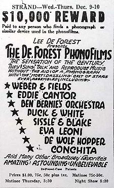 All-text advertisement from the Strand Theater, giving dates, times, and performers' names. At the top, a tagline reads, "$10,000 reward paid to any person who finds a phonograph or similar device used in the phonofilms." The accompanying promotional text describes the slate of sound pictures as "the sensation of the century ... Amazing! Astounding! Unbelievable".