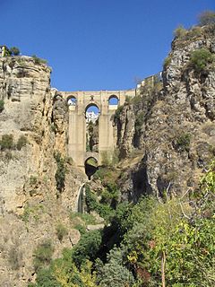 The 1793 Puente Nuevo bridge allows viewing from 120 m above the floor of El Tajo canyon.