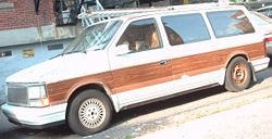 1990 Chrysler Town & Country with woodgrain applique.