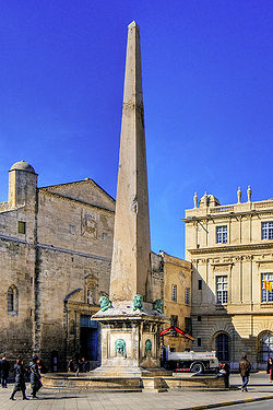 The Arles Obelisk in front of the Arles town hall (right)