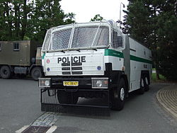 Riot van, white with green horizontal stripe