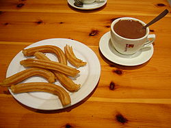 Churros served with thick hot chocolate