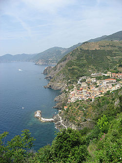 A view of the National Park of the Cinque Terre with Riomaggiore, one of the five coastal villages, directly below.