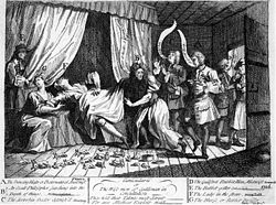 A woman apparently in labour lies on a tester bed, her legs dangling over the edge.  Rabbits are on the floor beneath her, some in parts.  A nurse is seated to the left, and to the extreme left a man stands, partially hidden by a curtain.  A man wearing a wig has his right arm beneath the woman's skirts, to the right one man says "A Sooterkin", another says "A great birth".  Near a door on the right of the image, a man says "It's too big" to another man stood in the doorway, holding a rabbit.  Rows of text at the bottom describe the people in the image.