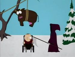 In a snowy outside setting, a Grim Reaper-like figure in a black robes and hood holding a scythe faces an elderly man in a wheelchair, who sits directly underneath a cow suspended by ropes hanging from a tree.