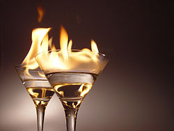 "Flaming" cocktails contain a small amount of flammable high-proof alcohol which is ignited prior to consumption.