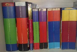 British editions of all seven Harry Potter books, (starting from left) Harry Potter and the Half-Blood Prince, Harry Potter and the Deathly Hallows, Harry Potter and the Philosopher's Stone, Harry Potter and the Chamber of Secrets, Harry Potter and the Prisoner of Azkaban, Harry Potter and the Goblet of Fire, and Harry Potter and the Order of the Phoenix.