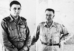 Half-length portrait of two men in tropical military uniforms