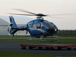 Blue-and-gray police helicopter